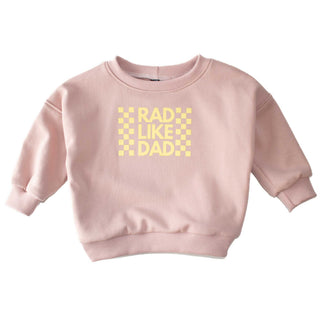 Pink Lemonade Rad Like Dad Crewneck Sweatshirt for kids. Showcased in a flat lay to highlight the luxury pima cotton fabric and graphic design by My Mini Explorer. Handmade in Montana. 