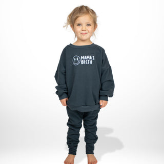 Child wearing Pacific-colored organic cotton sweatpants by My Mini Explorer, perfect for exploring the outdoors. Adventure-ready fit with eco-friendly comfort.